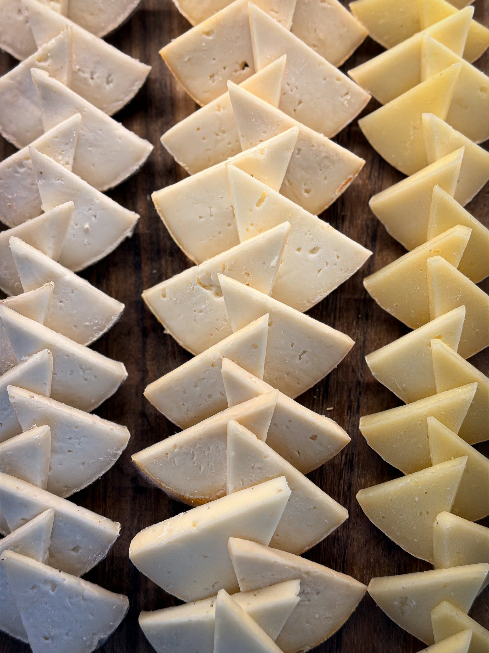 Rows of cheese wedges, a source of calcium